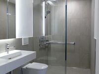 Dusche in Badezimmer UG