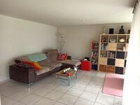 Wohnzimmer mit Balkon